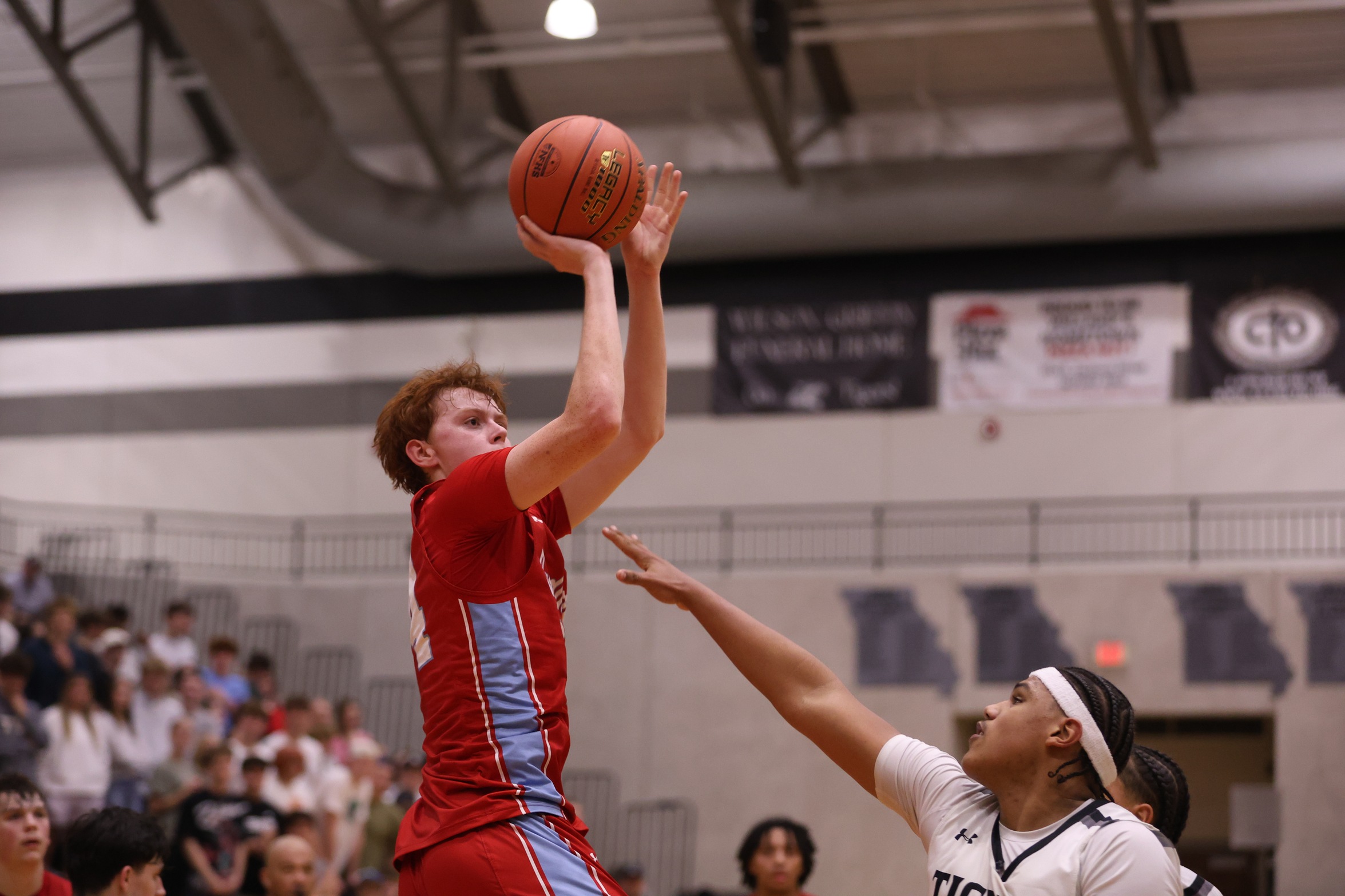 Cardinals stopped in opening round of district